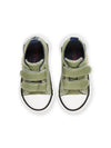 Khaki canvas sneakers with dinosaur patch