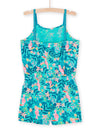 Light turquoise jumpsuit with tropical print