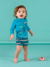 Turquoise t-shirt and swim shorts with fancy print