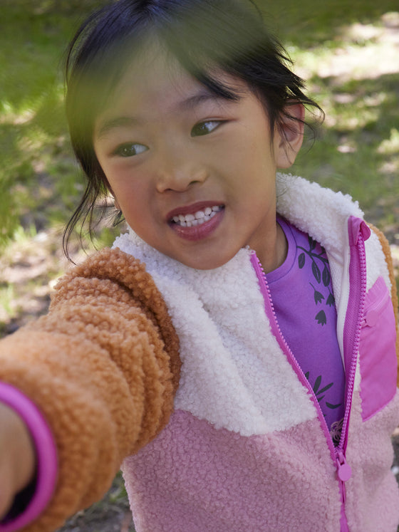 Girl orange. pink and ecru sherpa colorblock jacket