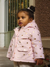 Baby girl dragé pink raincoat with polka dot print