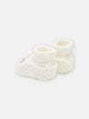 Offwhite baby booties with cat design