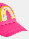 girls pink cap with rainbow pattern