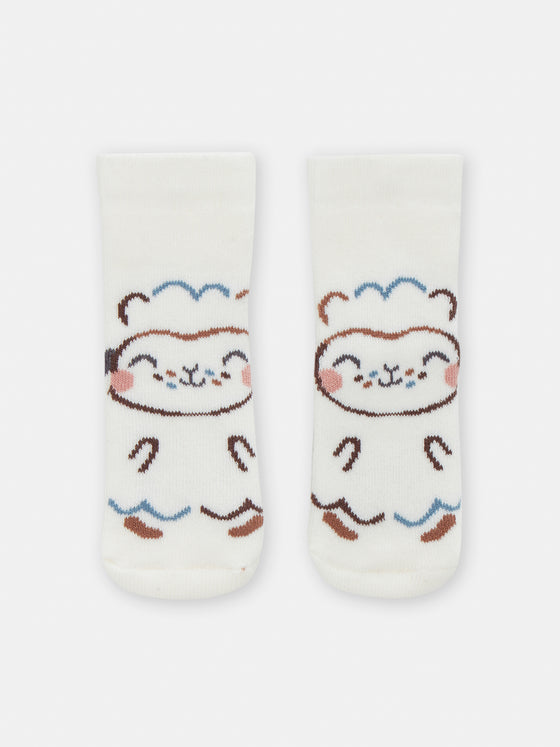 Ecru birth socks with sheep animation