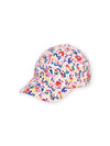 Multicolored cap with spotted print