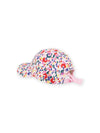 Multicolored cap with spotted print